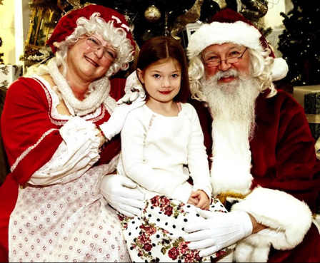 Dec 24 - With Santa and Mrs. Claus.
